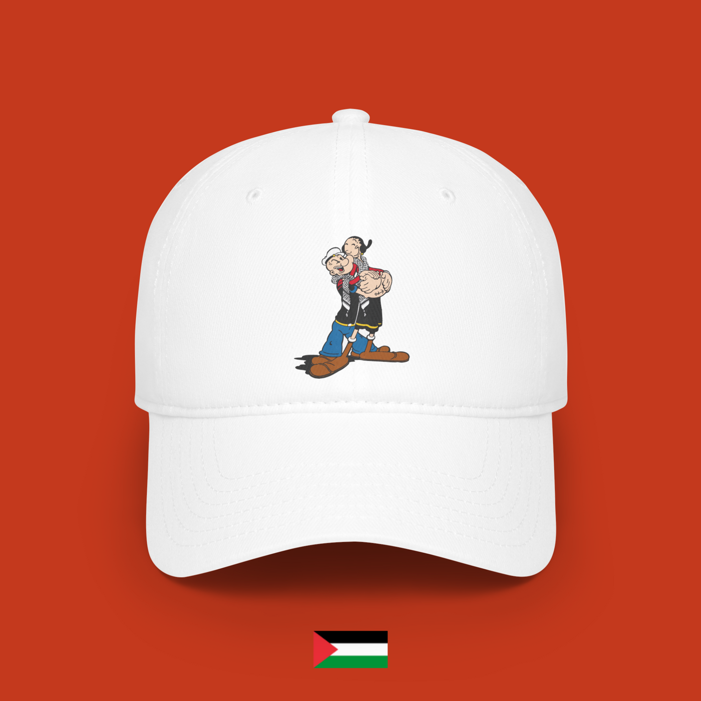 Popeye and Olivia hugging with keffiyeh - hat